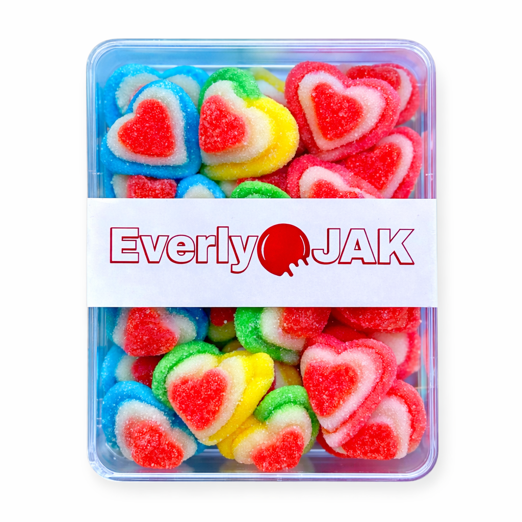 Container of colorful heart-shaped gummy candies with 'Everly Jak' branding.
