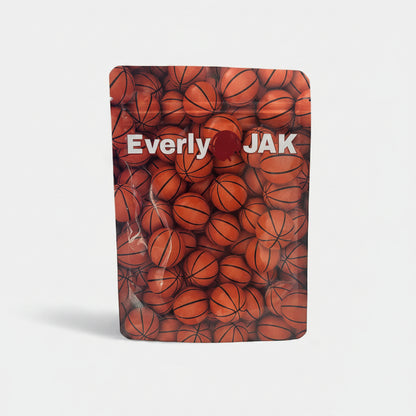 Packaged product with basketball design and 'Everly Jak' branding on a white background